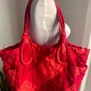 Marc Jacobs quilted bright pink nylon bag.